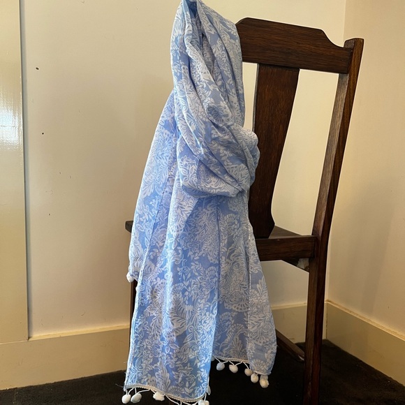 Light weight blue and white scarf. Polyester. With Pom poms at either end - Picture 3 of 9